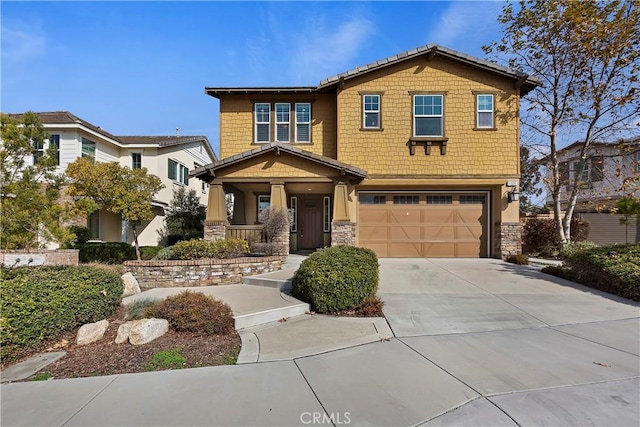 view of front of property with a garage