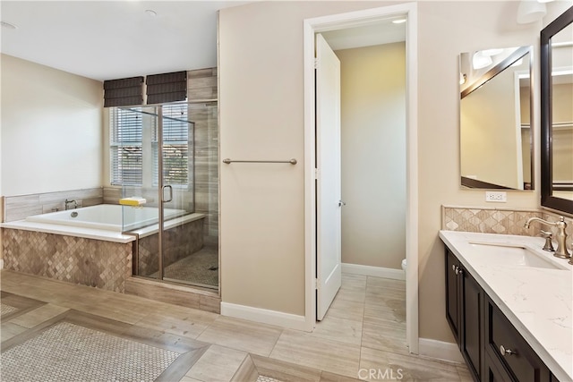 full bathroom with vanity, toilet, tile patterned flooring, and plus walk in shower