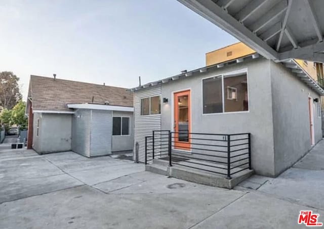 rear view of house featuring a patio area