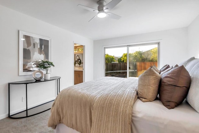 carpeted bedroom featuring ceiling fan and access to exterior