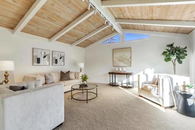 living room featuring rail lighting, carpet floors, vaulted ceiling with beams, and wood ceiling