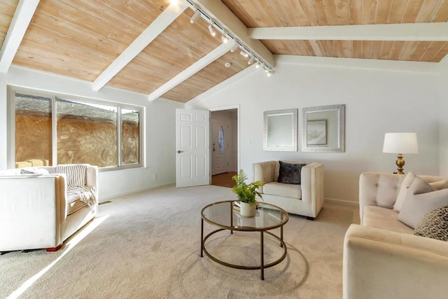 living room with lofted ceiling with beams, track lighting, light colored carpet, and wooden ceiling