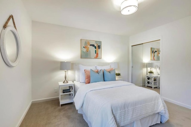 carpeted bedroom featuring a closet