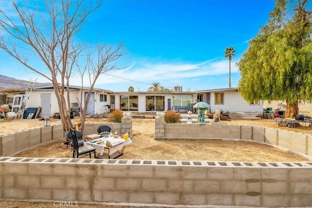 single story home with a patio area