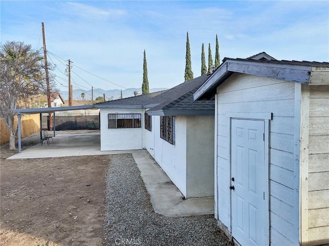 view of home's exterior with a patio