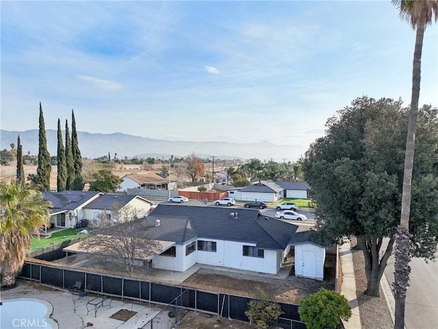 drone / aerial view featuring a mountain view