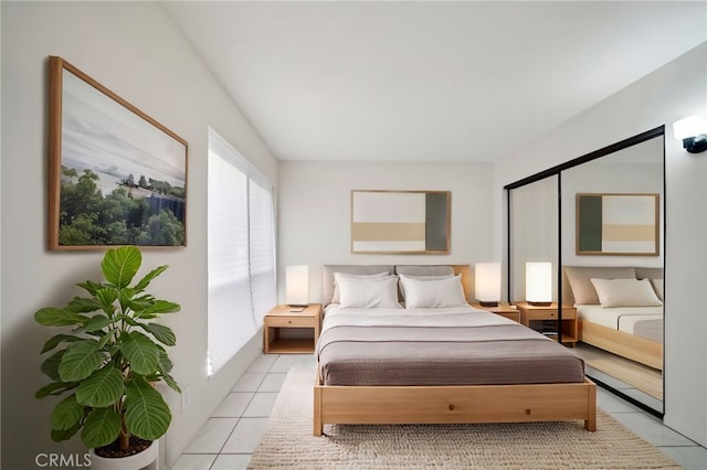 bedroom featuring light tile patterned floors