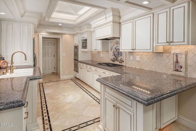 kitchen featuring sink, dark stone countertops, ornamental molding, kitchen peninsula, and stainless steel appliances