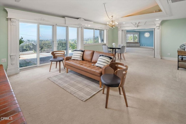 carpeted living room featuring an inviting chandelier and a tray ceiling