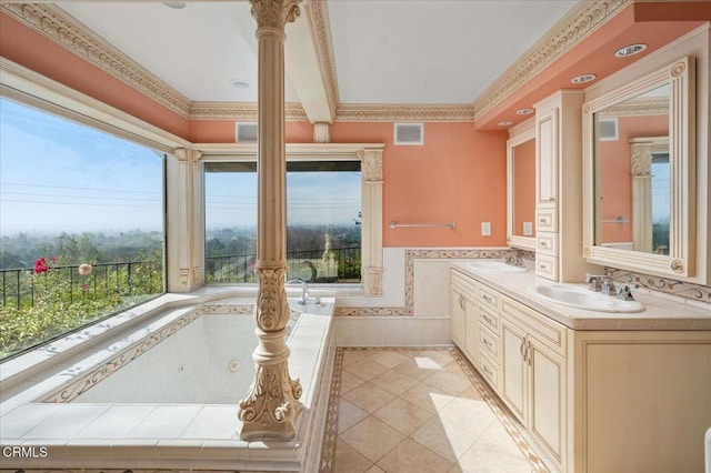 bathroom featuring crown molding, tile walls, vanity, a bathtub, and tile patterned flooring