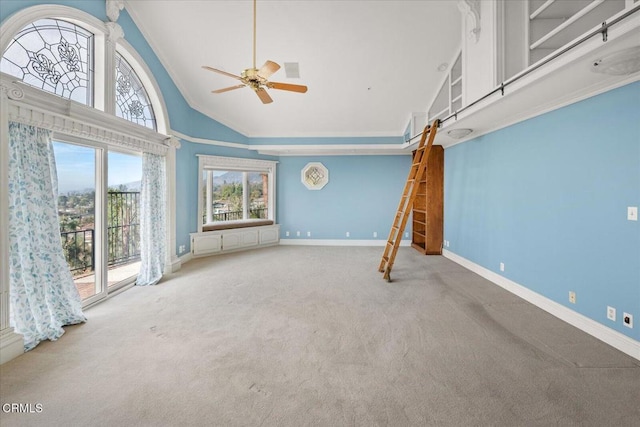 unfurnished living room with crown molding, high vaulted ceiling, ceiling fan, and carpet flooring