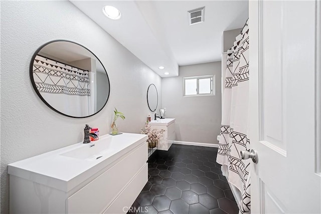 62 Pepper Tree Rd, Chula Vista, CA 91910 - bathroom with tile patterned floors and vanity