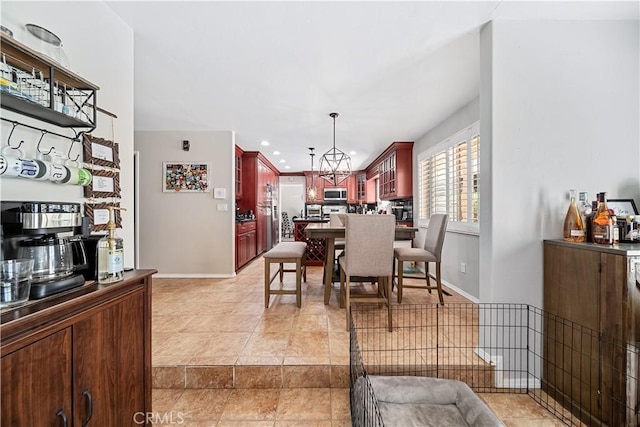 62 Pepper Tree Rd, Chula Vista, CA 91910 - tiled dining room featuring a notable chandelier
