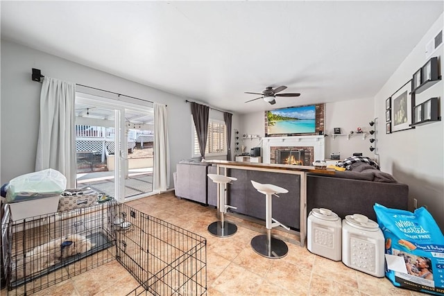 62 Pepper Tree Rd, Chula Vista, CA 91910 - kitchen featuring ceiling fan and a brick fireplace