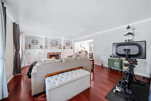 62 Pepper Tree Rd, Chula Vista, CA 91910 - bedroom with crown molding, dark wood-type flooring, and a fireplace