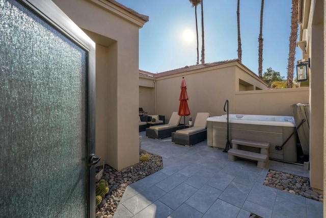 view of patio featuring a hot tub