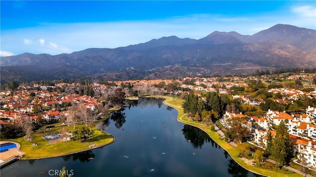 aerial view with a residential view and a water and mountain view