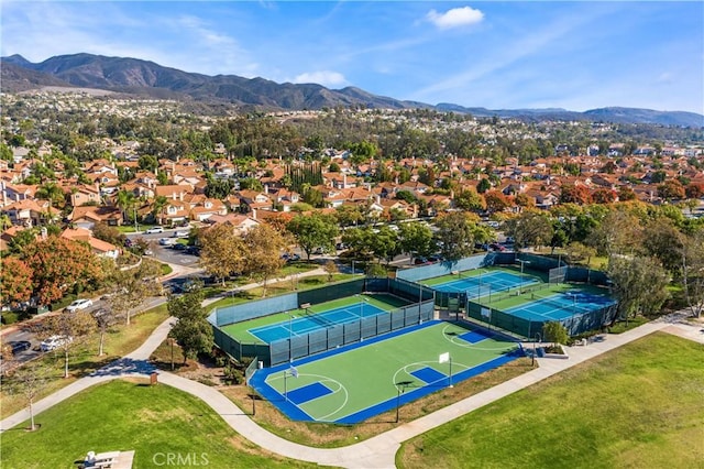 birds eye view of property with a residential view and a mountain view