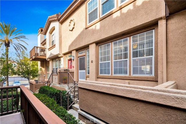 exterior space with stucco siding