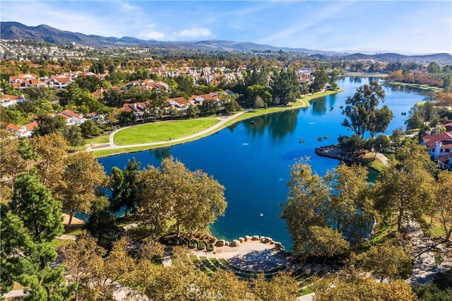 bird's eye view with a water and mountain view