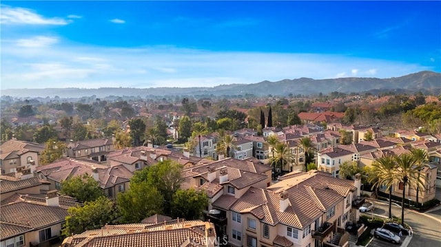 aerial view with a mountain view and a residential view