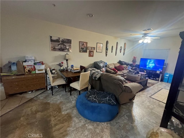 living room featuring ceiling fan