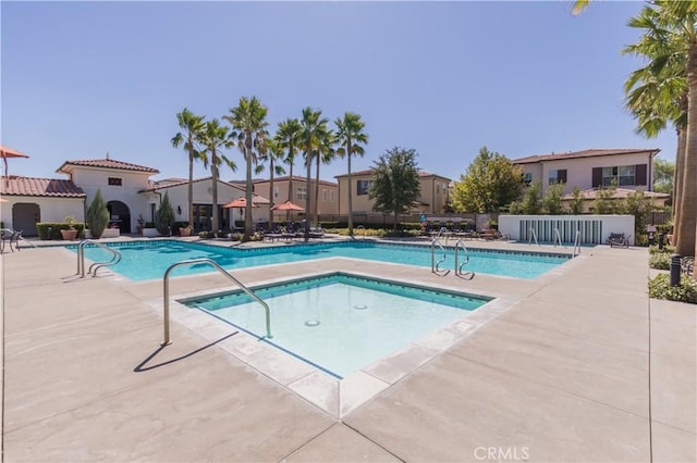 view of swimming pool featuring a patio