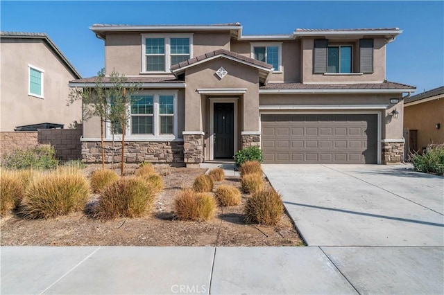 view of front of property featuring a garage