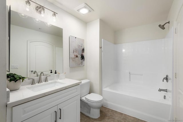 full bathroom featuring shower / tub combination, vanity, and toilet