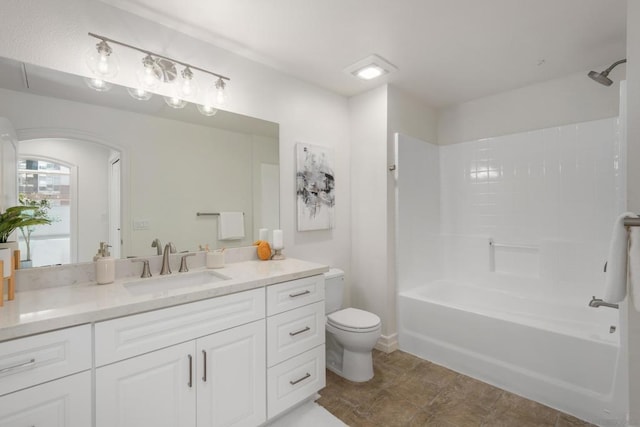 full bathroom featuring vanity, toilet, and shower / bath combination