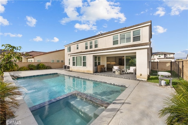 rear view of house featuring a swimming pool with hot tub, central AC, a patio, an outdoor hangout area, and pool water feature