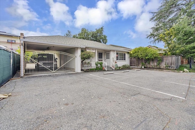 view of front of house with a carport