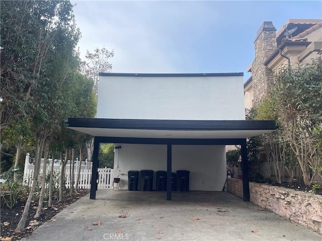 exterior space featuring a carport