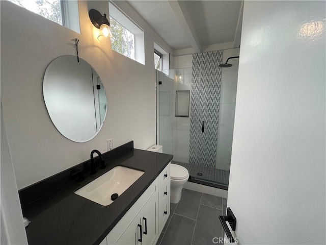 bathroom with toilet, a stall shower, beam ceiling, and vanity