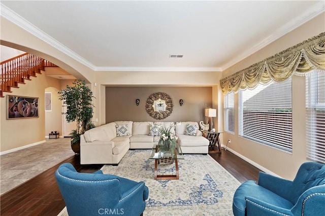 living room featuring crown molding and hardwood / wood-style flooring