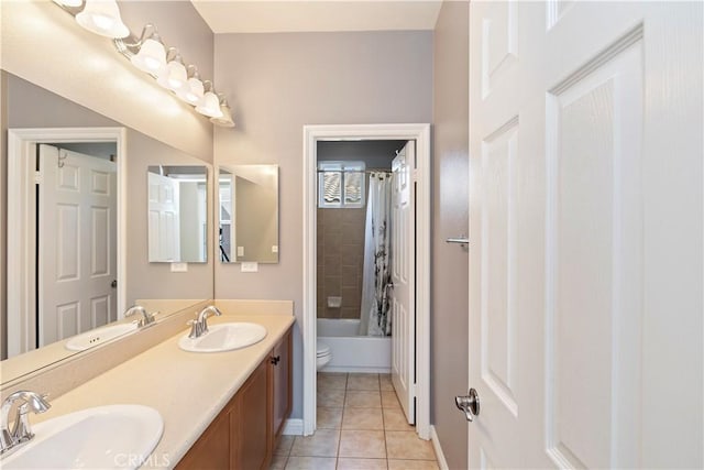 full bathroom with tile patterned flooring, vanity, shower / bathtub combination with curtain, and toilet