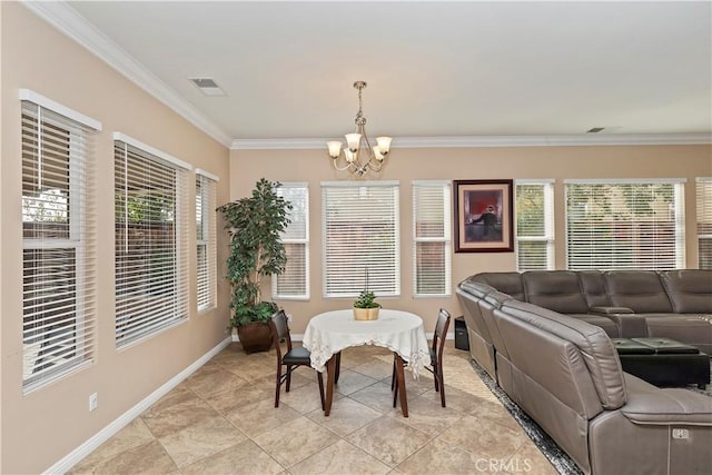 tiled dining area with an inviting chandelier and ornamental molding