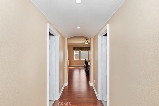 hallway with dark hardwood / wood-style floors