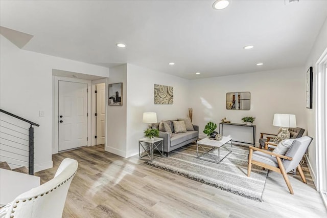 living room with light hardwood / wood-style flooring