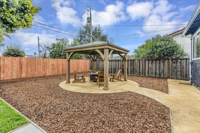 view of yard with a gazebo and a patio