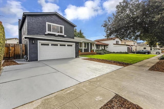 view of front property featuring a garage and a front lawn