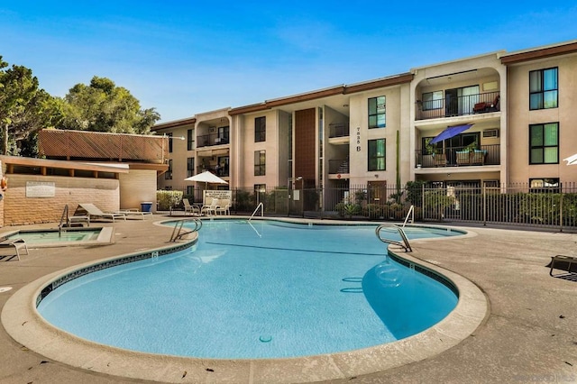 view of swimming pool featuring a patio