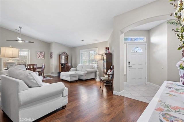 living room featuring hardwood / wood-style flooring and lofted ceiling