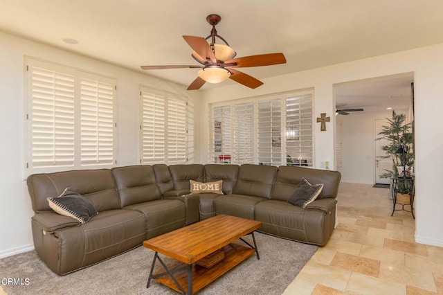 living room with ceiling fan