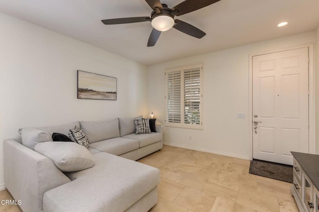 living room featuring ceiling fan