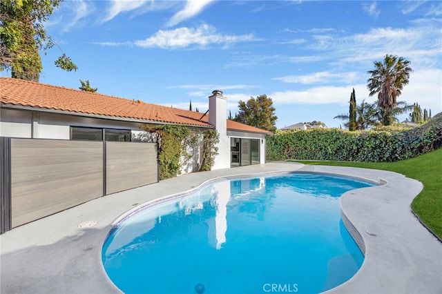 view of pool featuring a patio area