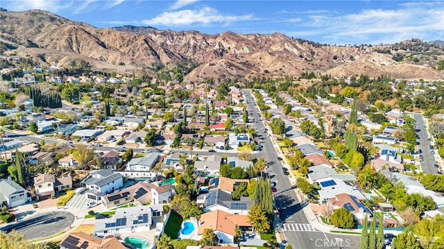 drone / aerial view featuring a mountain view