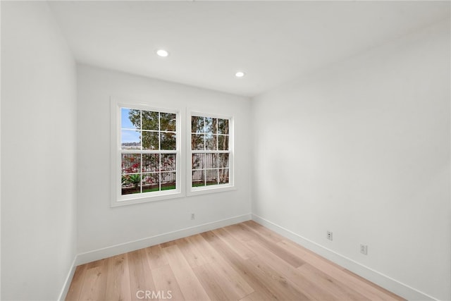 empty room featuring light hardwood / wood-style floors