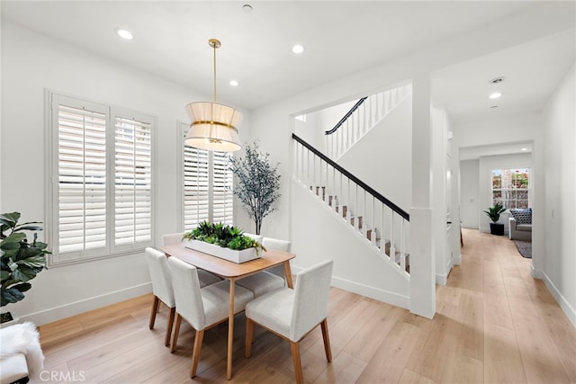 dining area with light wood-type flooring