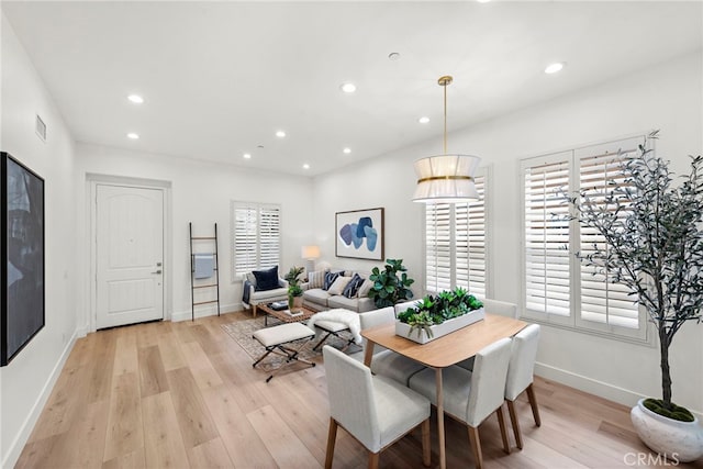 dining area featuring light hardwood / wood-style flooring